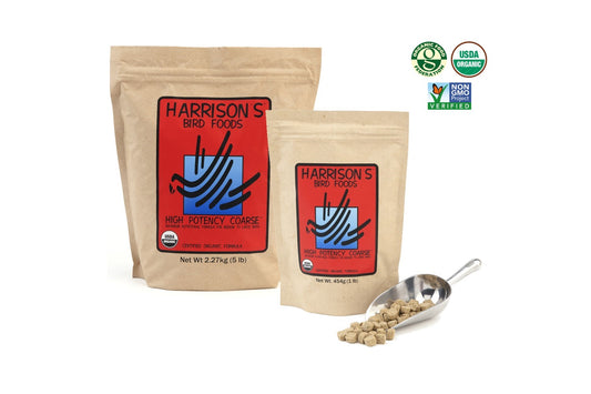 A 2.27kg and 454g bag of Harrison's High Potency Coarse, next to a metal scoop full of the nuggets