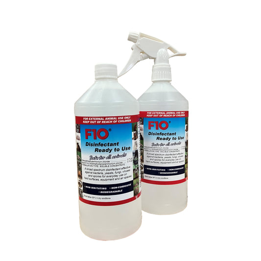 Two 1 litre bottles of F10 Disinfectant Ready to Use, one with a trigger spray